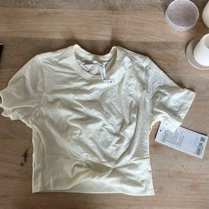 Lululemon cropped cotton ribbed band tee. Size 6. Light yellow/cream